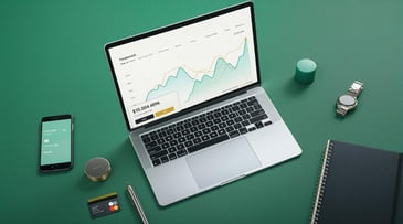 A laptop displaying financial data with graphs, a smartphone, notepad, and pen on a green background.